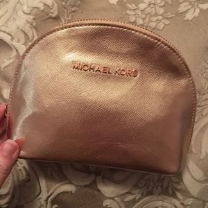 Micheal Kors Metallic Rose Gold makeup bag